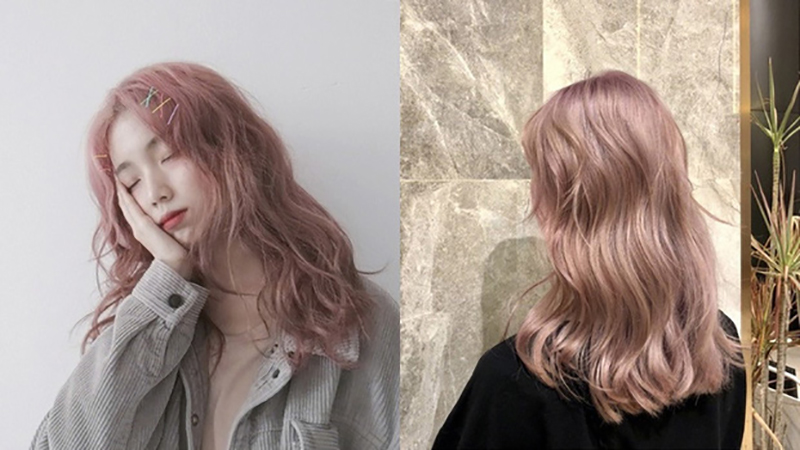 Cô gái có mái tóc xoăn dài màu khói cam hồng